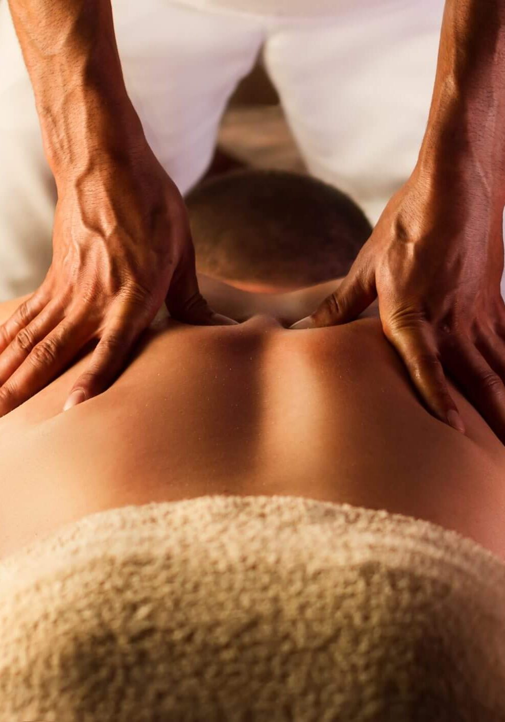 Person receiving a relaxing back massage.